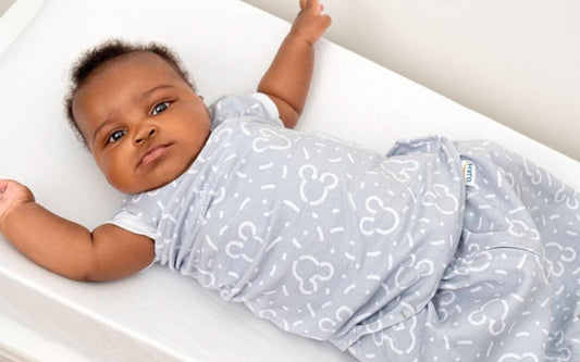 Should You Swaddle With Arms In or Out? Age-Based Advice for Safer, Better Sleep